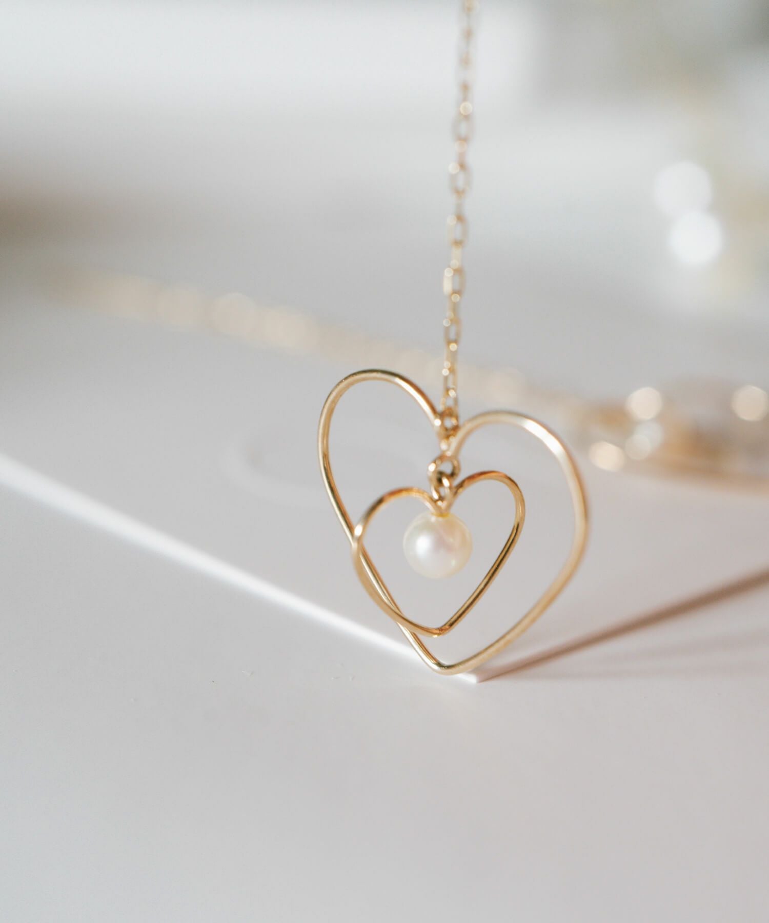 パール ピアス 揺れる ハート ピアス キラキラ 【perle-hearts-pe